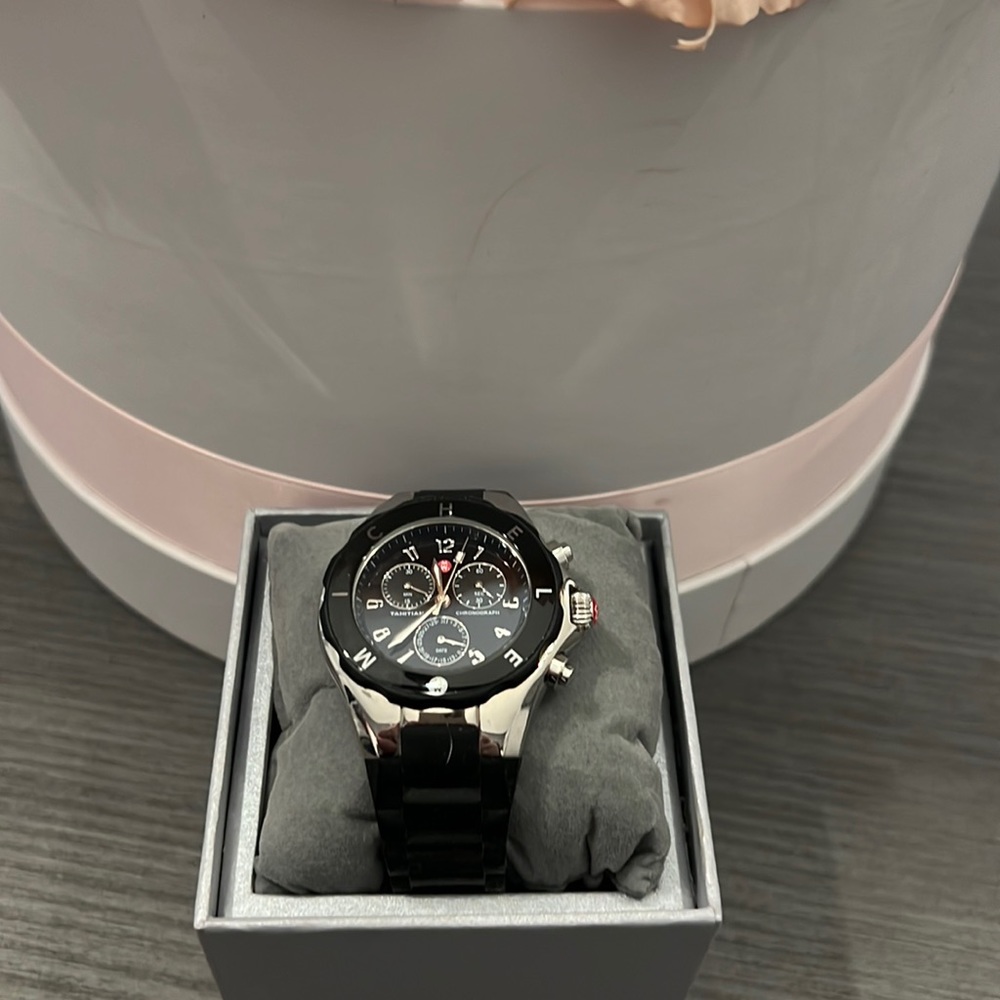 Michelle watch with black rubber band.